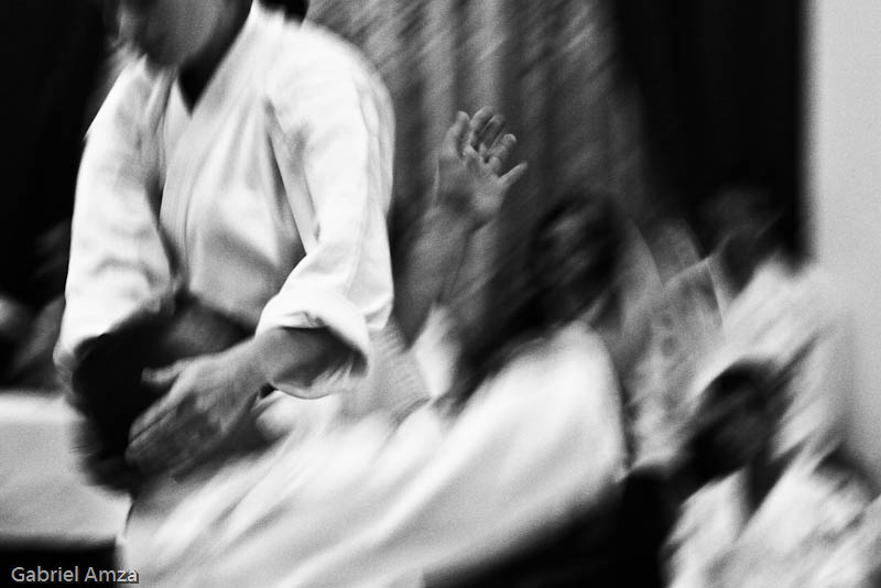 A man falling during an Aikido demonstration